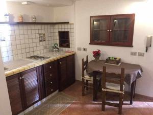 A kitchen or kitchenette at Il Convento Alghero