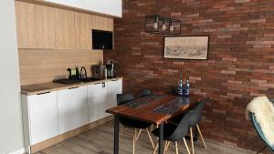 Kuchyň nebo kuchyňský kout v ubytování Apartament górski 595