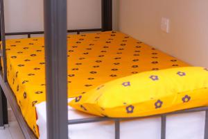 Katil atau katil-katil dalam bilik di BOSTON APARTMENTS DODOMA