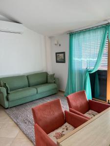 Prostor za sedenje u objektu Apartments Radulovic