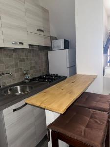 Kuchyňa alebo kuchynka v ubytovaní Casa vacanze su sorighe.