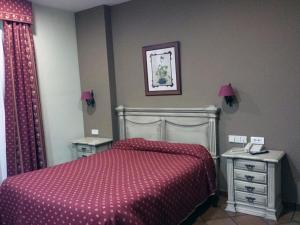 A bed or beds in a room at Los Bronces