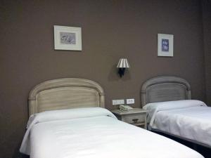 A bed or beds in a room at Los Bronces