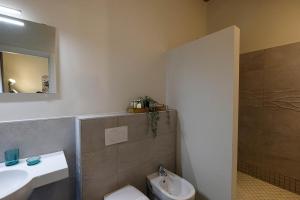 Koupelna v ubytování Verona Suites and Rooms
