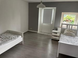 Ένα ή περισσότερα κρεβάτια σε δωμάτιο στο Dill Apartments Gr. Lafferde