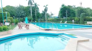 Gallery image of Goa Country Club Near Park Hospital BY Pearl I Luxury resort in Gurgaon in Gurgaon +90 photos