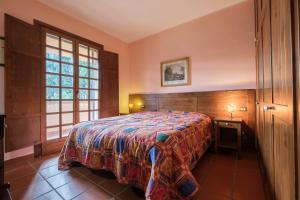 a bedroom with a large bed and a window at Green Health in Messina