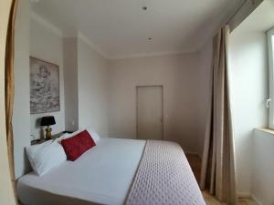 Postel nebo postele na pokoji v ubytování Palazzo Pisani Malta Boutique and SPA