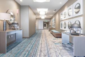 a corridor of a hotel room with a hallway at Fairfield Inn & Suites by Marriott San Jose North/Silicon Valley in San Jose