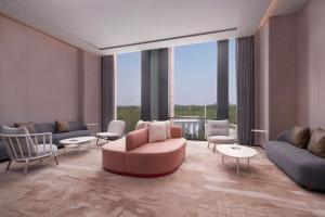 Posezení v ubytování Four Points by Sheraton Tianjin National Convention and Exhibition Center