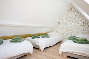 Postel nebo postele na pokoji v ubytování Gîte Les Écureuils