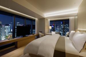 Postel nebo postele na pokoji v ubytování The Westin Yokohama
