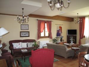 TV a/nebo společenská místnost v ubytování Hotel Casa Anita