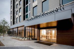 a store front of a building with a sign on it at Residence Inn by Marriott Dallas Frisco in Frisco