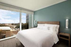 Letto o letti in una camera di Element Austin at The Domain