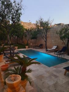 Bazén v ubytování Palazzo Pisani Malta Boutique and SPA nebo v jeho okolí
