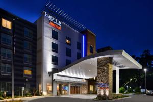 a rendering of a hotel at night at Fairfield Inn & Suites by Marriott Orlando East/UCF Area in Orlando