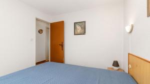 Posteľ alebo postele v izbe v ubytovaní Le Centaure- 307- Appart grande terrasse- 5 pers