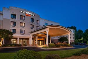 a rendering of a hotel with a building at Courtyard High Point in High Point