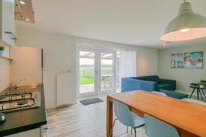 Posezení v ubytování Vakantiehuis Hoeve Zuid - Groote Keeten aan Zee