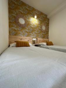 Postel nebo postele na pokoji v ubytování Apartamento Marval PLAYA DE LEVANTE + 23 fotografií
