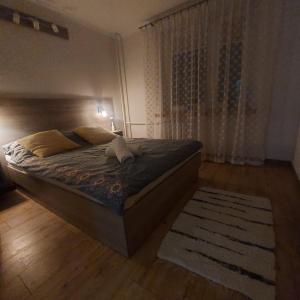 Posteľ alebo postele v izbe v ubytovaní Apartament Izabella
