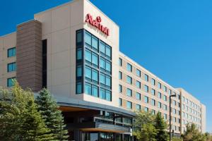 an office building with aania sign on it at Denver Marriott South at Park Meadows in Lone Tree