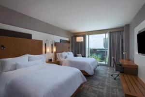 Postel nebo postele na pokoji v ubytování The Westin Irving Convention Center at Las Colinas