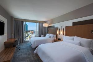 Postel nebo postele na pokoji v ubytování The Westin Irving Convention Center at Las Colinas