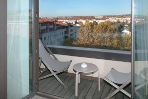 Balkón nebo terasa v ubytování Renaissance Aix-en-Provence Hotel