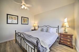 a bedroom with a bed and a ceiling fan at Reno Vacation Rental 1 Mi to Casinos! in Reno