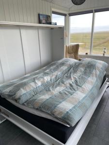 Postel nebo postele na pokoji v ubytování Knaldhytten