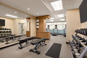 a gym with rows of chairs and desks at TownePlace Suites Cedar Rapids Marion in Marion