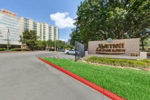 a sign for aventitz university hospital on a street at Houston Marriott North in Houston