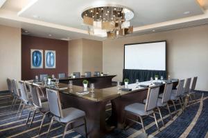 a large conference room with a long table and chairs at Residence Inn by Marriott Phoenix Downtown in Phoenix