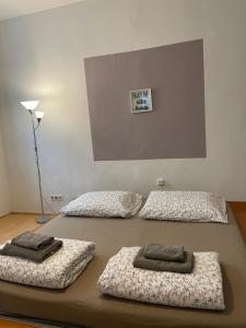 Ένα ή περισσότερα κρεβάτια σε δωμάτιο στο Schloss Belvedere Private Rooms