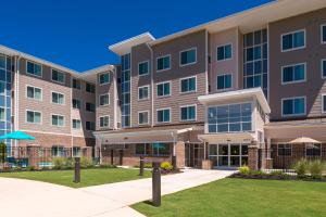 an exterior view of an apartment building at Residence Inn by Marriott Decatur in Decatur