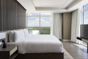 Cama ou camas em um quarto em JW Marriott Orlando Bonnet Creek Resort & Spa