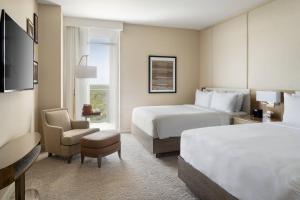 Cama ou camas em um quarto em JW Marriott Orlando Bonnet Creek Resort & Spa
