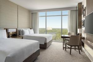 Cama ou camas em um quarto em JW Marriott Orlando Bonnet Creek Resort & Spa