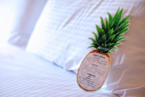 Katil atau katil-katil dalam bilik di Mellow Fields Hotel