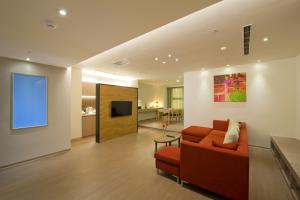 Televisyen dan/atau pusat hiburan di Mellow Fields Hotel