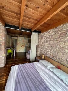 Postel nebo postele na pokoji v ubytování LA CASETTA NEI COLLI