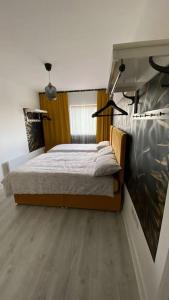 a bedroom with a bed in a room at Stunning Modern 2bed Apt Near Dublin City& Airport in Dublin