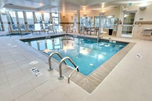 a pool in the middle of a building at Courtyard by Marriott York in York