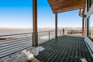 a porch of a house with a view of the desert at The Belle of Bear Lake in Fish Haven