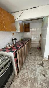 a kitchen with a counter top in a room at Carpe Diem in Las Heras