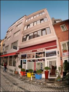 a building on a street with a hotel at Palace Point Hotel in Istanbul