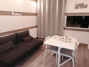 Część wypoczynkowa w obiekcie Appartement studio domaine de l'Alpe d'Huez, Villard Reculas