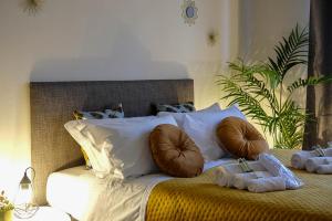 Postel nebo postele na pokoji v ubytování Verona Suites and Rooms